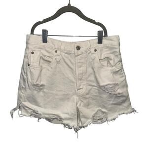 White distressed free people denim